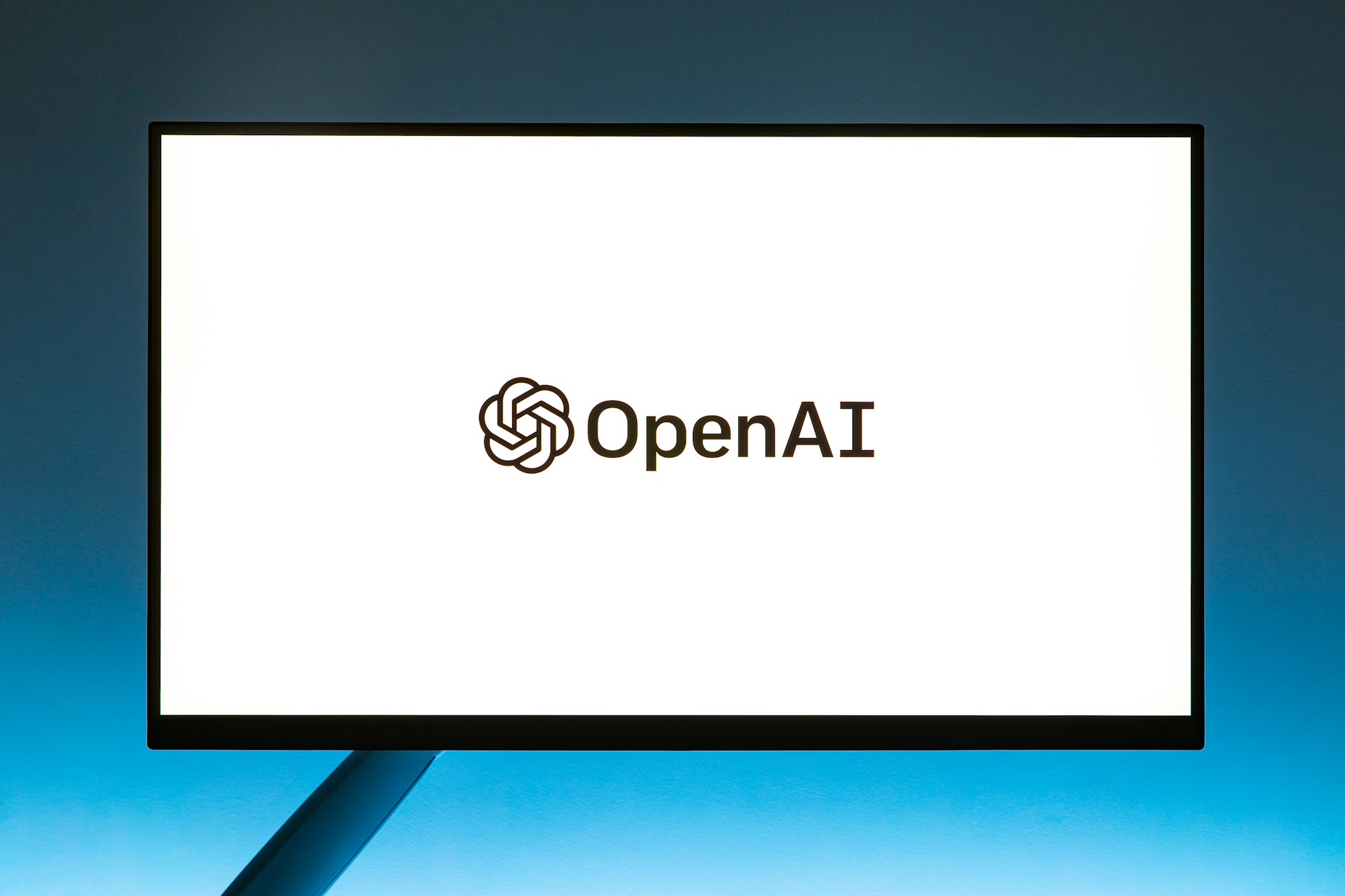 OpenAI logo on screen