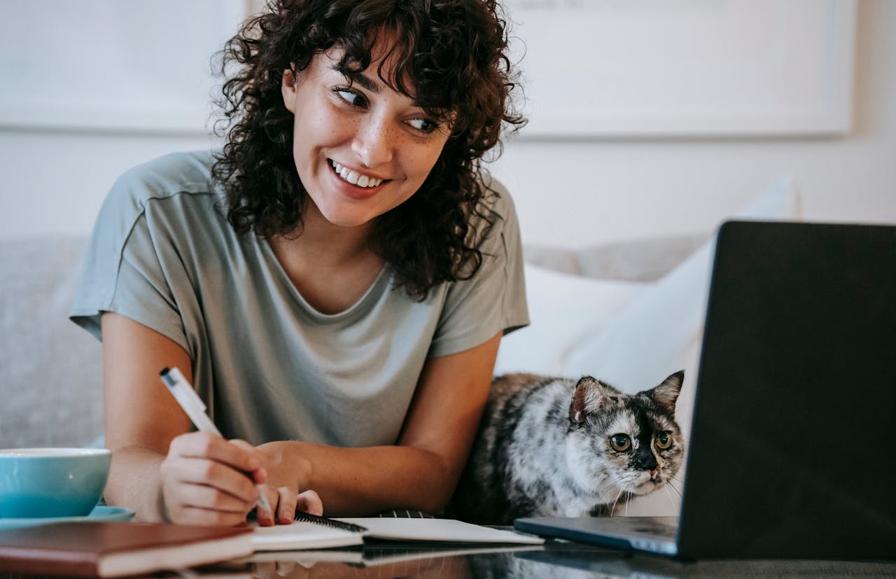 woman writing meeting notes
